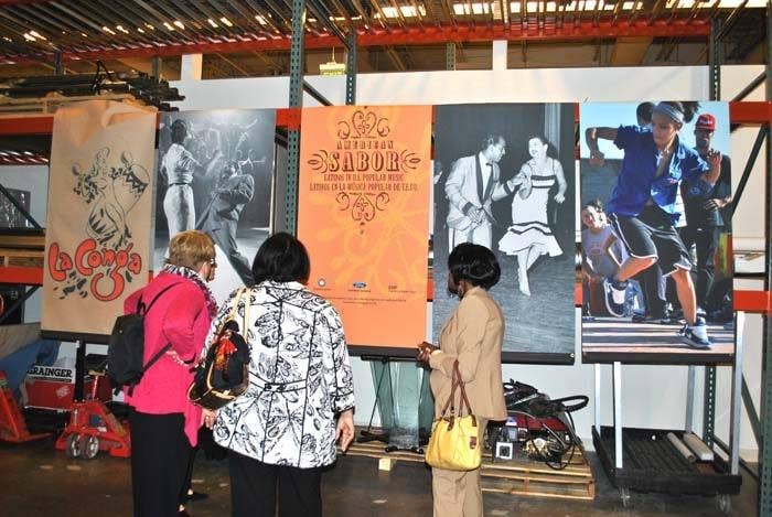 women looking at an exposition