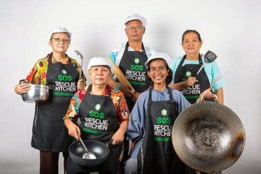 A group of cooks showing their working tools