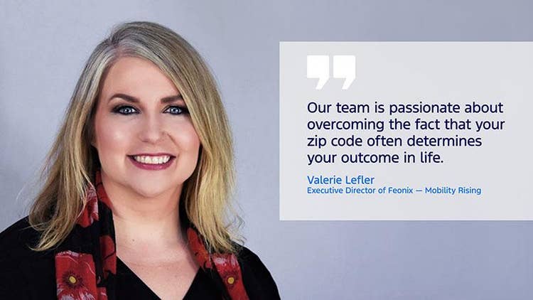 Female with shoulder-length, straight blonde hair, who is smiling and wearing a black blouse with red poppies to the left of text: Our team is passionate about overcoming the fact that your zip code often determines your outcome in life. Valerie Lefler Executive Director of Feonix - Mobility Rising