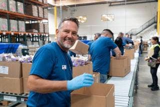 Frame of a man helping in th eproyect