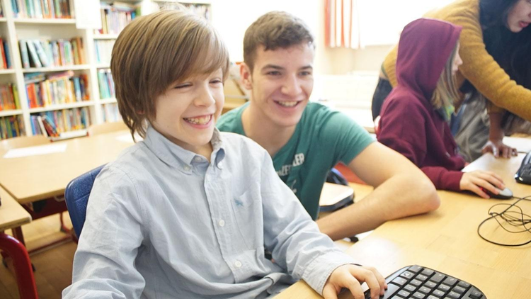 Volunteers helping kids