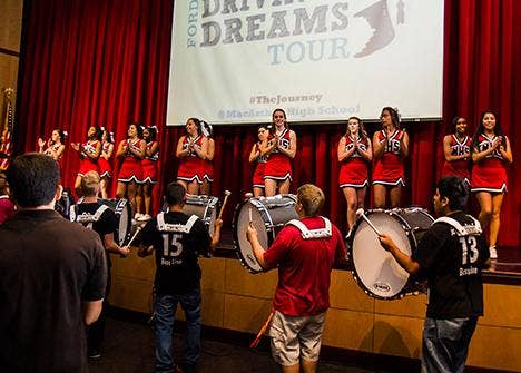 A band performing for the Driving Dreams Tour