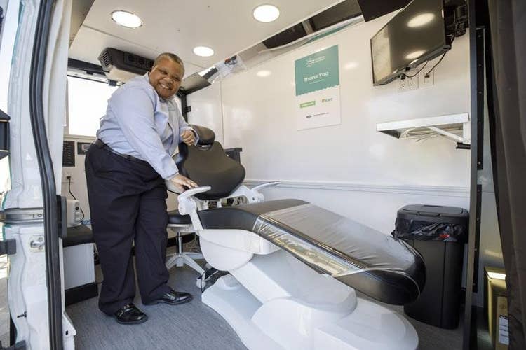 a man inside of a van