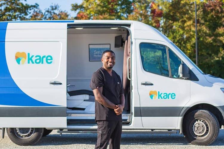 a man standing in front of a van