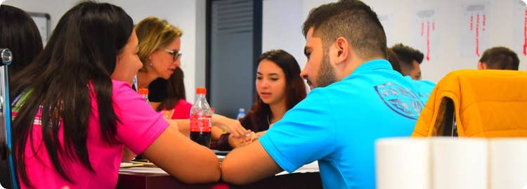 people in a room talking with each other