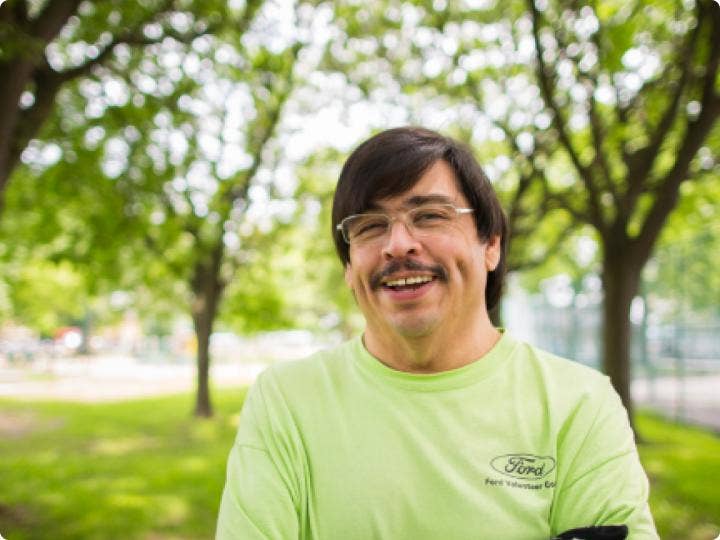 Ford powertrain engineer Roberto Teran as a volunteer at a park